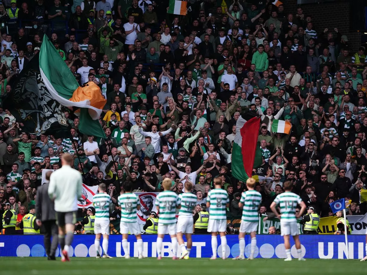 Celtic stars applaud the fans at Ibrox