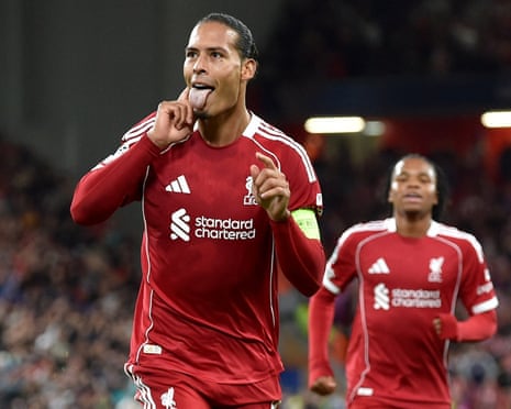 Liverpool’s Virgil van Dijk celebrates scoring their third goal.