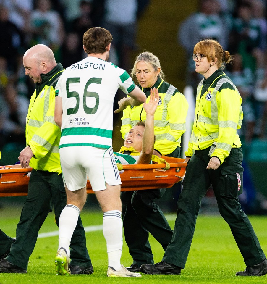 Alistair Johnston injured, being carried on a stretcher, and replaced by Tony Ralston.