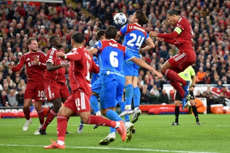 Liverpool’s Virgil van Dijk scores their third goal.