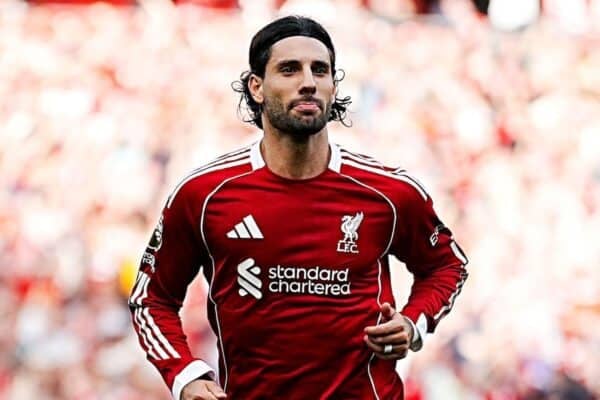 Dominik Szoboszlai (centre) celebrates scoring their side's first goal during the Premier League match at Anfield, Liverpool. Picture date: Sunday August 31, 2025. (Alamy Photo)