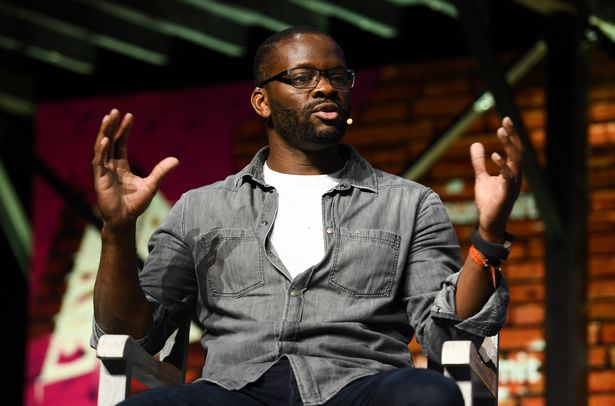 Louis Saha gestures with his arms