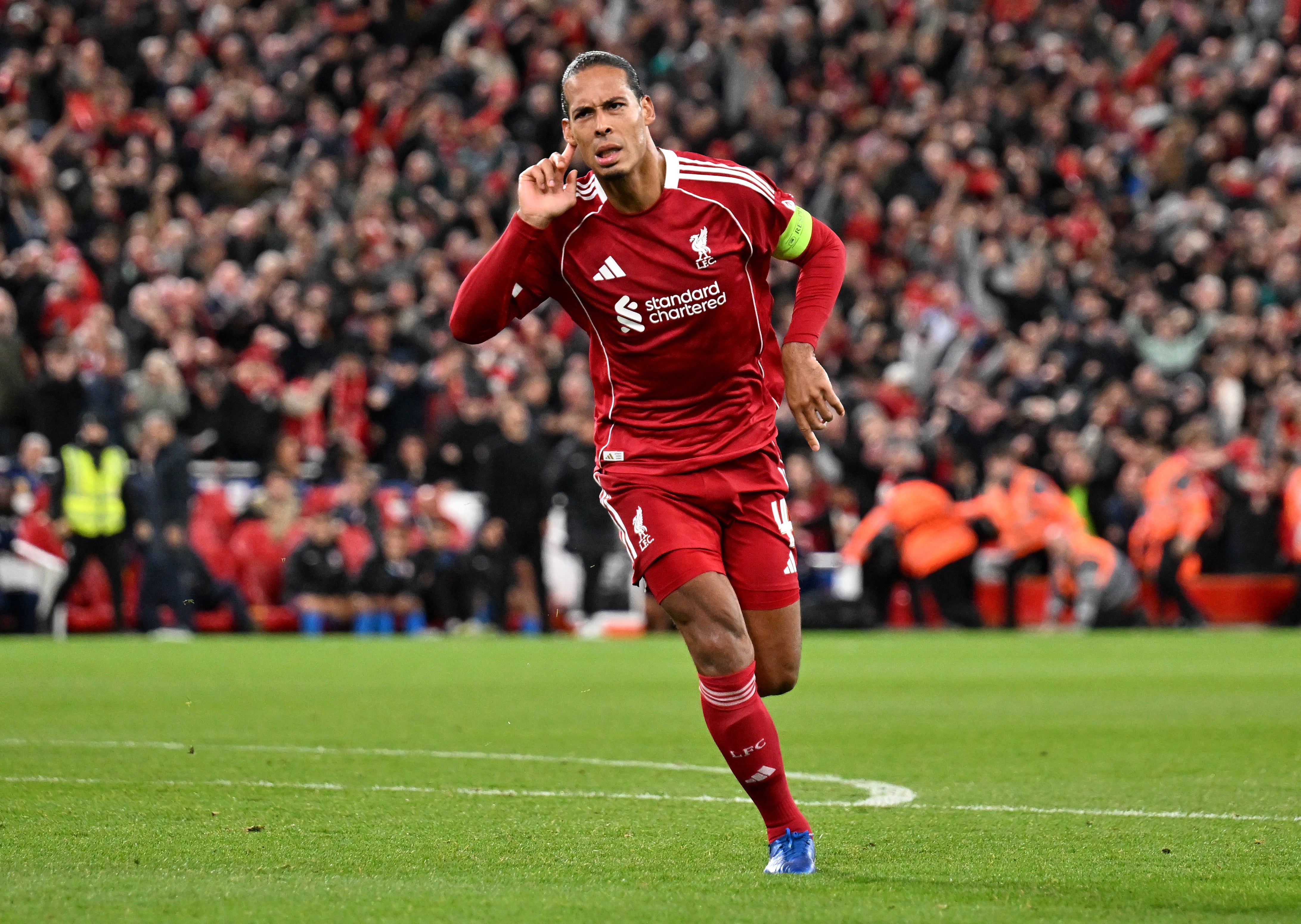 Virgil van Dijk celebrates Liverpool's late winner